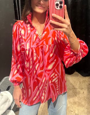 high ruffle collar v neck top