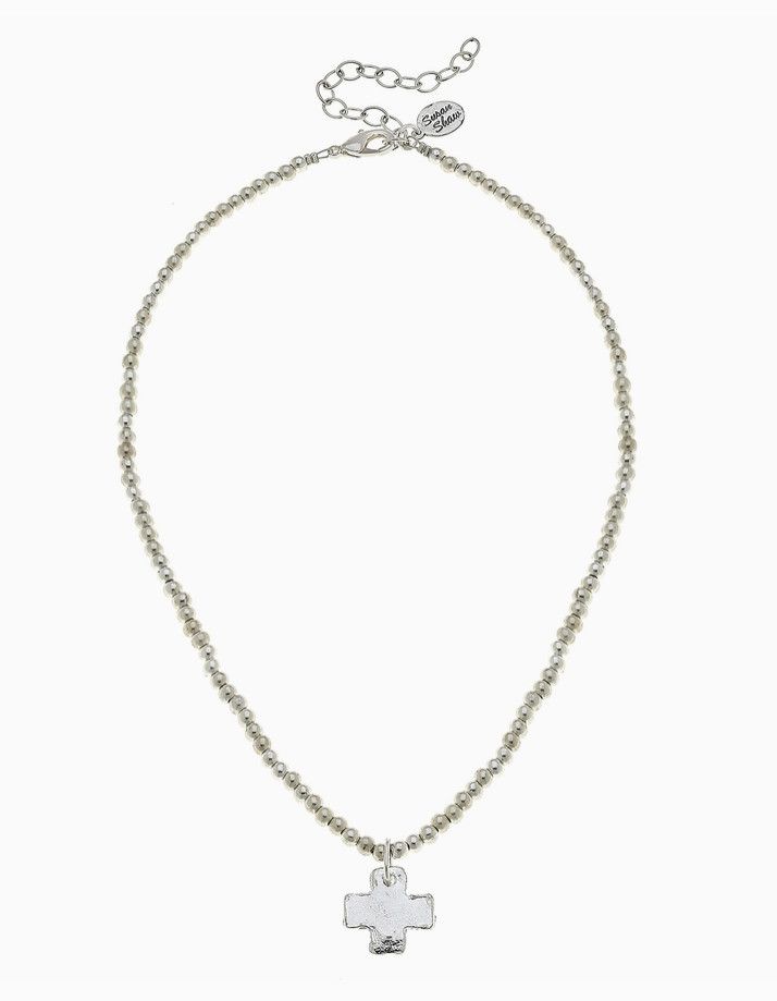 Silver cross on silver beaded necklace