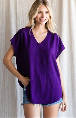 Solid top with short cap sleeves and raw edge hems