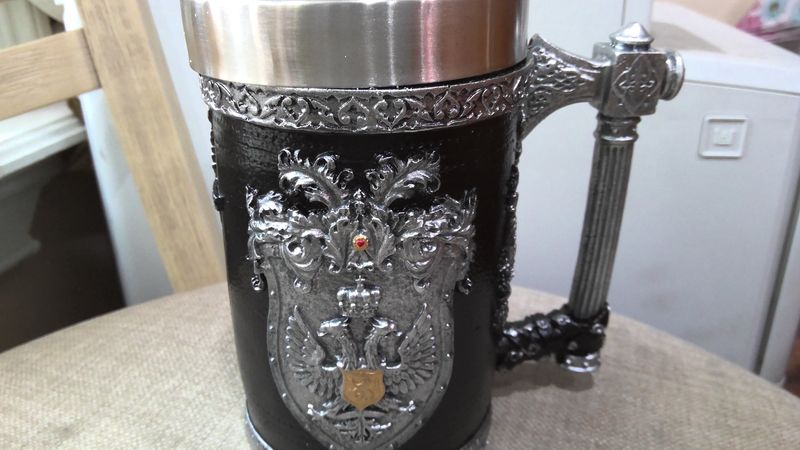 victory cup with swords