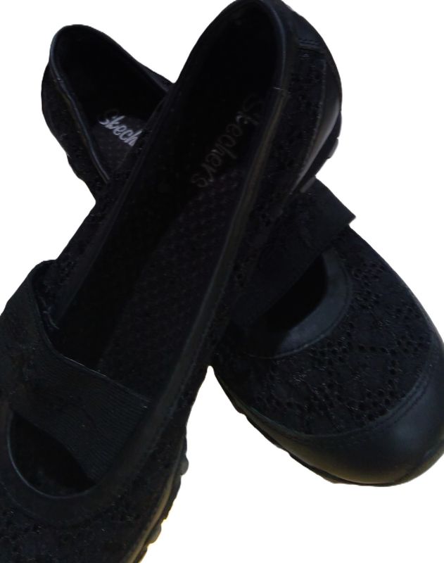 black skechers with flowered lace