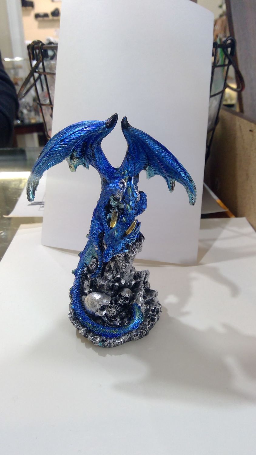 Blue Dragon with skulls statue