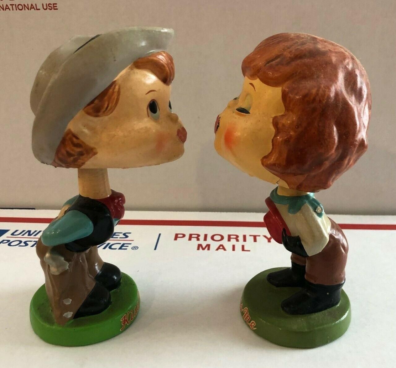 Vintage Kissing me  cowboy and cowgirl  bobblehead set