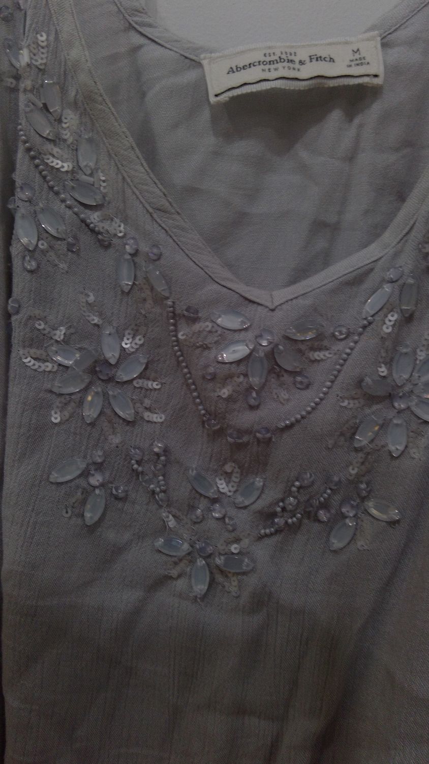 Abercrombie and Fitch size medium Gray tank top with beaded white sequences