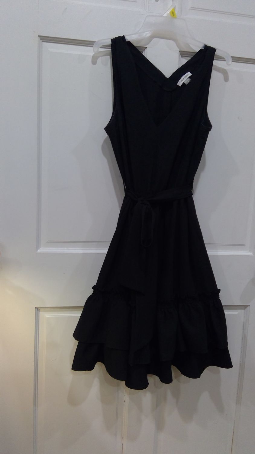 Calvin Klein black cocktail dress size 12 WITH RUFFLES AT BOTTOM