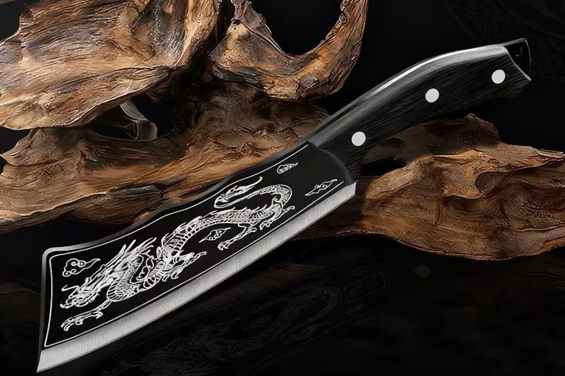A Dragon-Patterned Bone-, a Stainless Steel  Knife