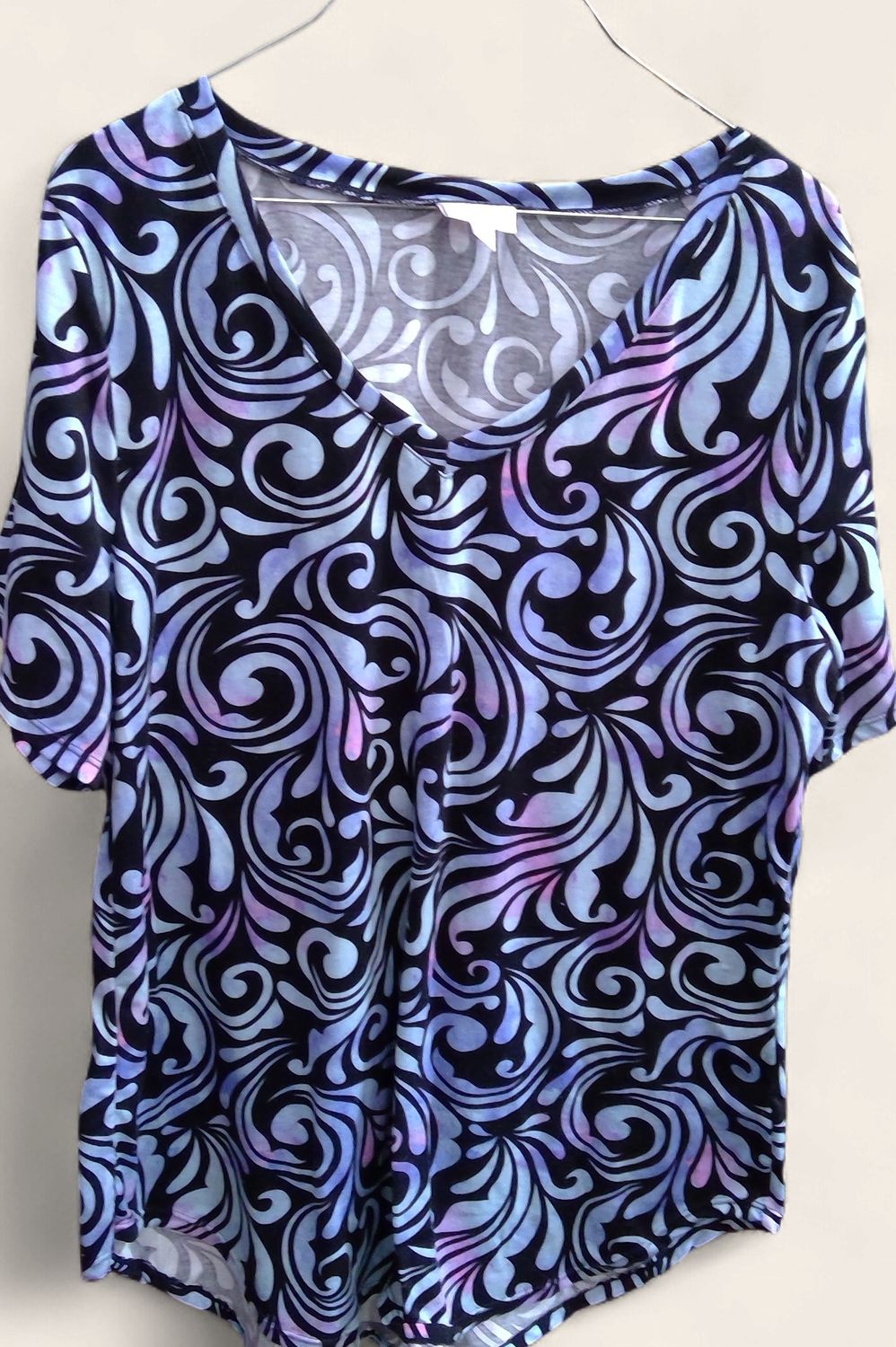 LuLaRoe Iris V-neck Tunic Top Featuring A Blue And Purple And White Paisley=style Pattern