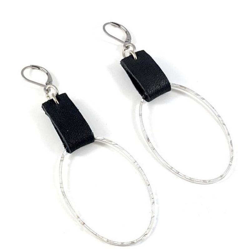 Queen Stella Sterling Silver Oval Earrings that Hang from leather on hypoallergenic stainless steel level back ear wires