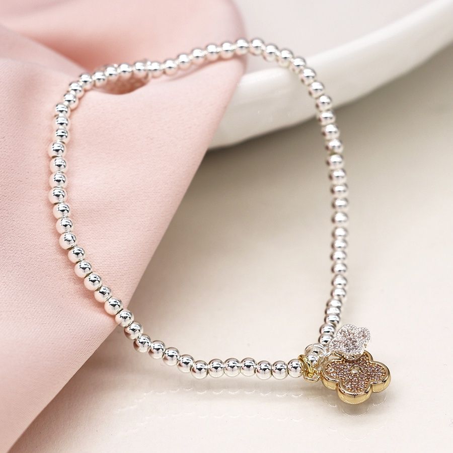 Faux gold and silver plated double quatrefoil bracelet with crystals