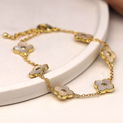 Golden chain and quatrefoil bracelet