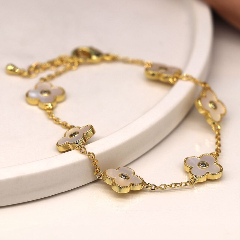 Golden chain and quatrefoil bracelet