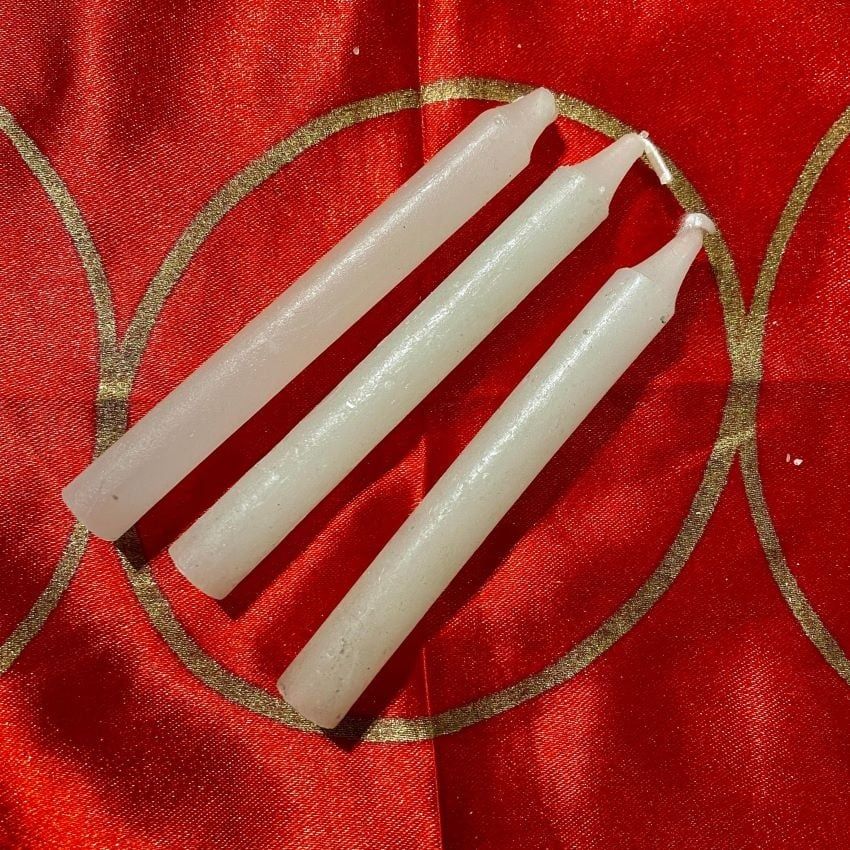 Three White Chime Spell Candles At 35c Each