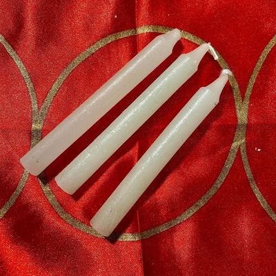 Three White Chime Spell Candles At 35c Each