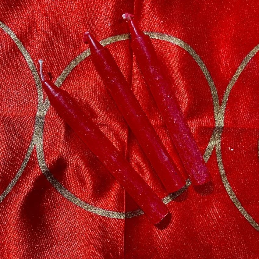 Three Red Chime Spell Candles At 35c Each