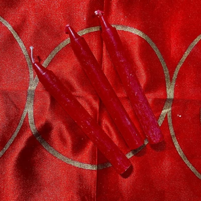 Three Red Chime Spell Candles At 35c Each