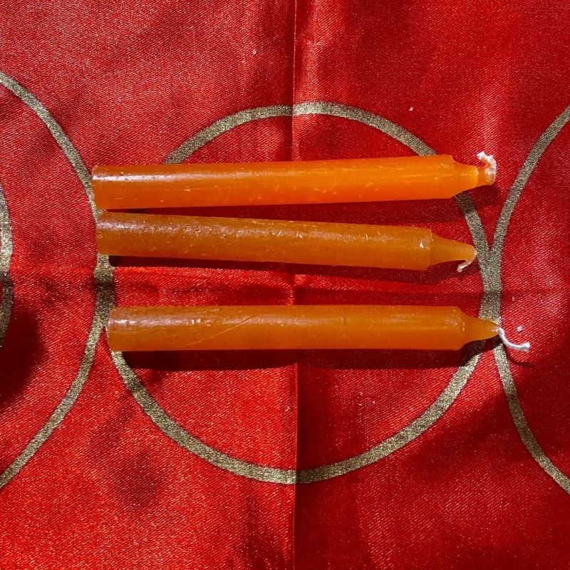 Three Orange Chime Spell Candles At 35c Each