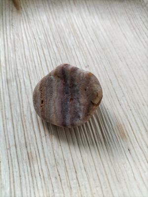 Gebande Calciet Trommelsteen