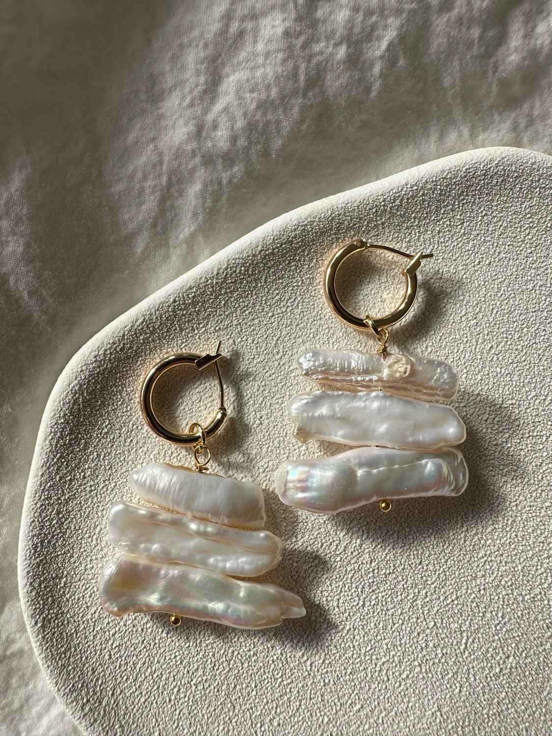 triple parallel pearl earrings