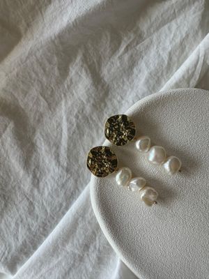 medallion pearl earrings