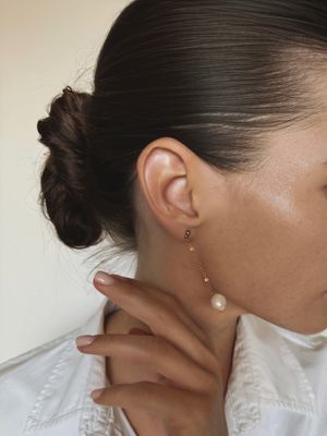 key pendant pearl earrings