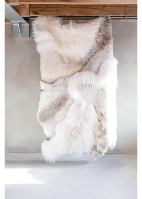 Melange schapenvacht tapijt wit en beige, 180x120cm toonzaalmodel Melange schapenvacht tapijt wit en beige, 180x120cm toonzaalmodel