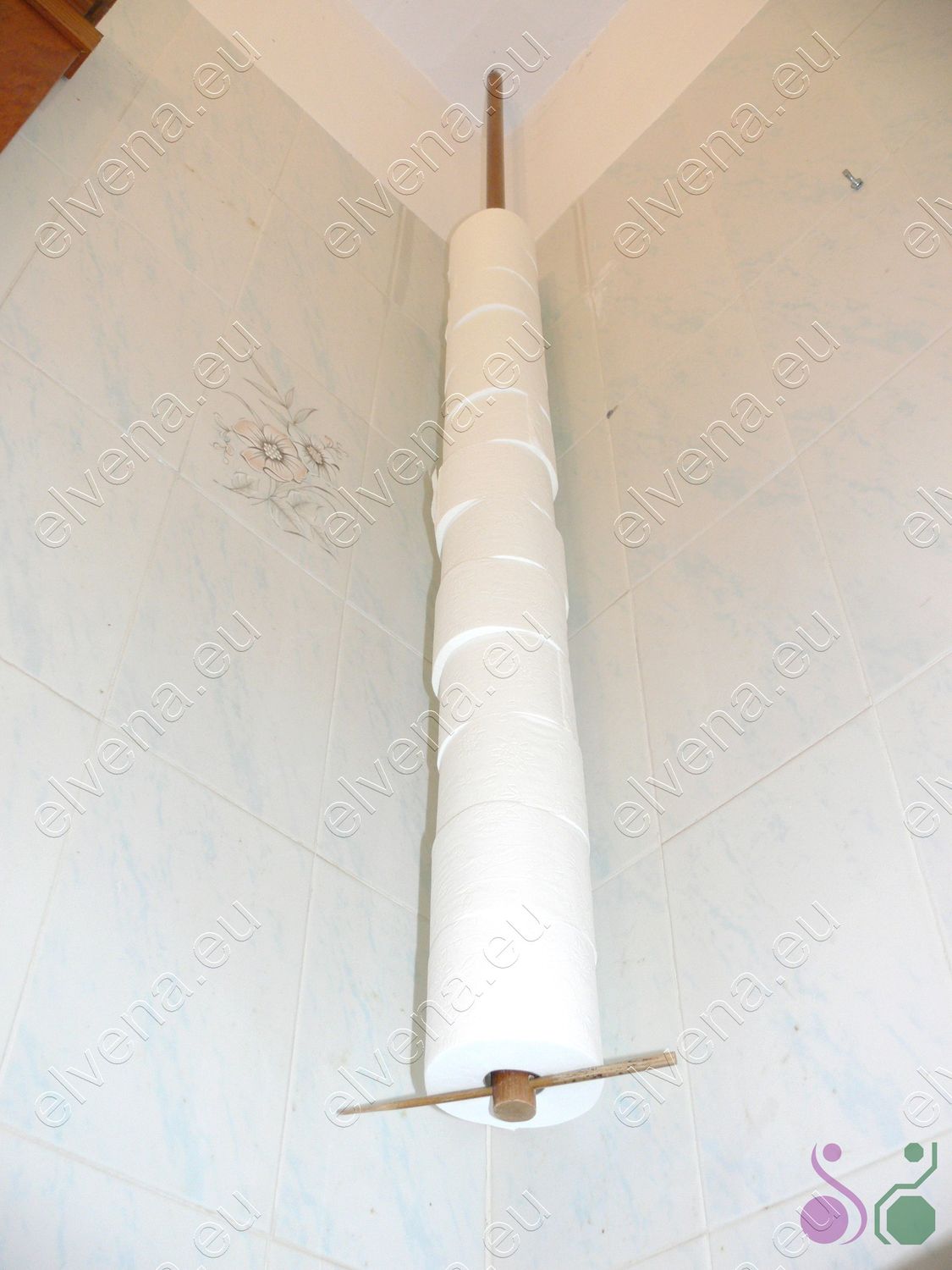 Space saving toilet paper holder.