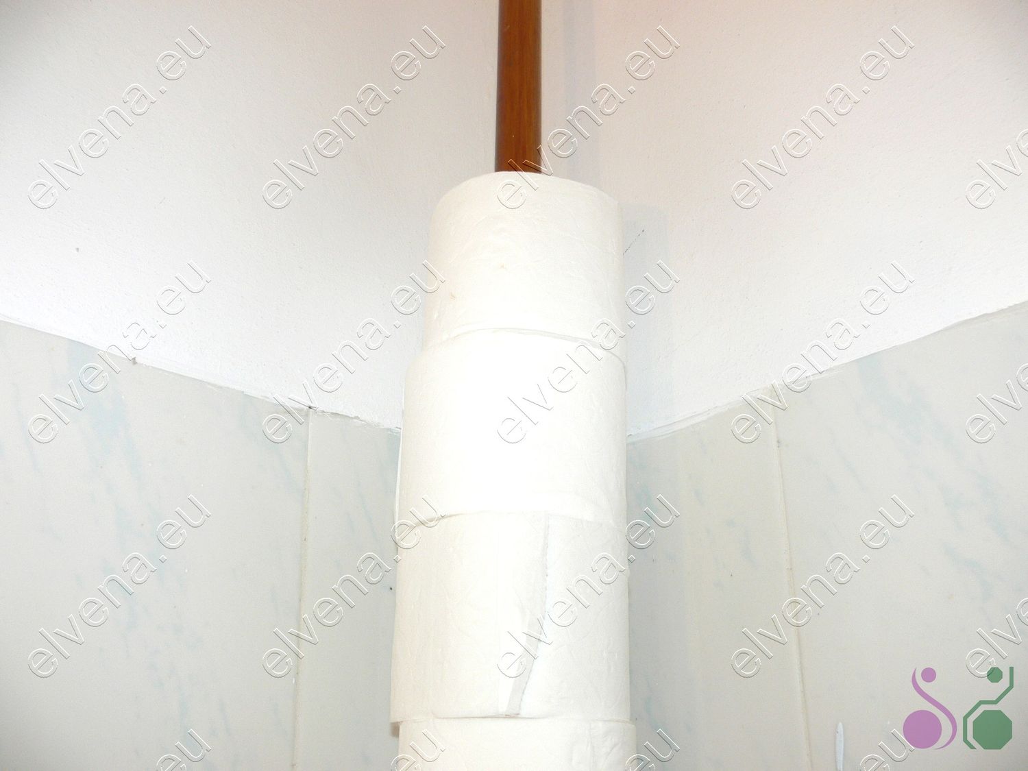 Space saving toilet paper holder.