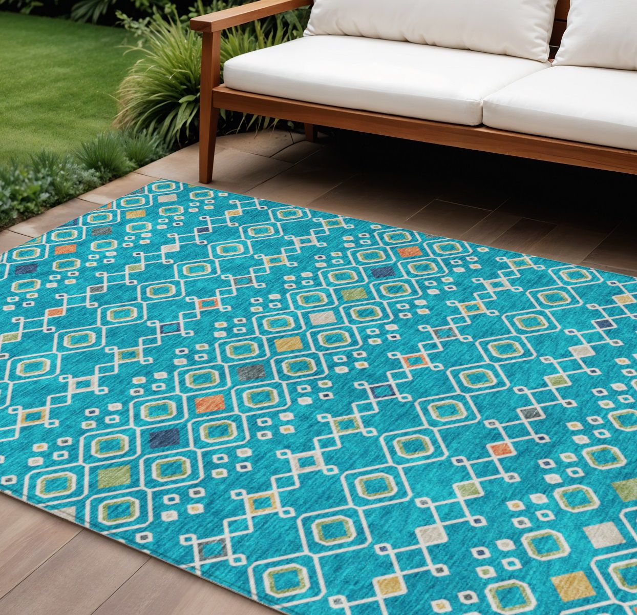 9&#39; X 12&#39; Teal Blue Ivory And Gold Geometric Washable Indoor Outdoor Area Rug