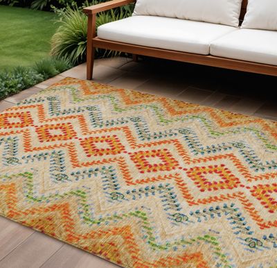 9&#39; X 12&#39; Beige Orange And Red Geometric Washable Indoor Outdoor Area Rug