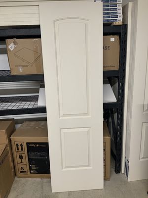2-panel arched ,1-3/8 non-bored hollow core 24’x80’‘ door