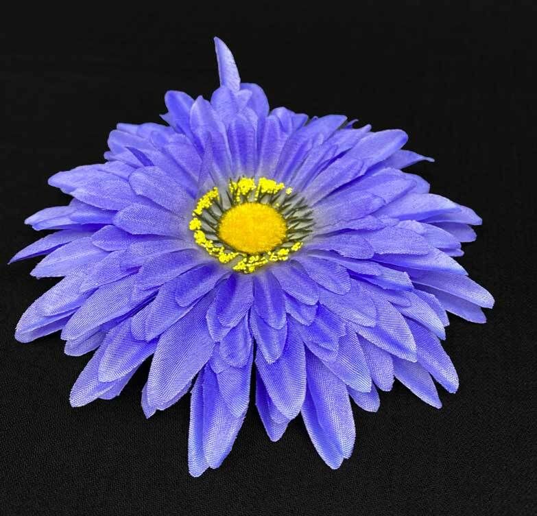 Violetti gerbera kestokukkapää
