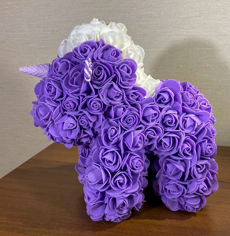 Ruusuyksisarvinen, violetti