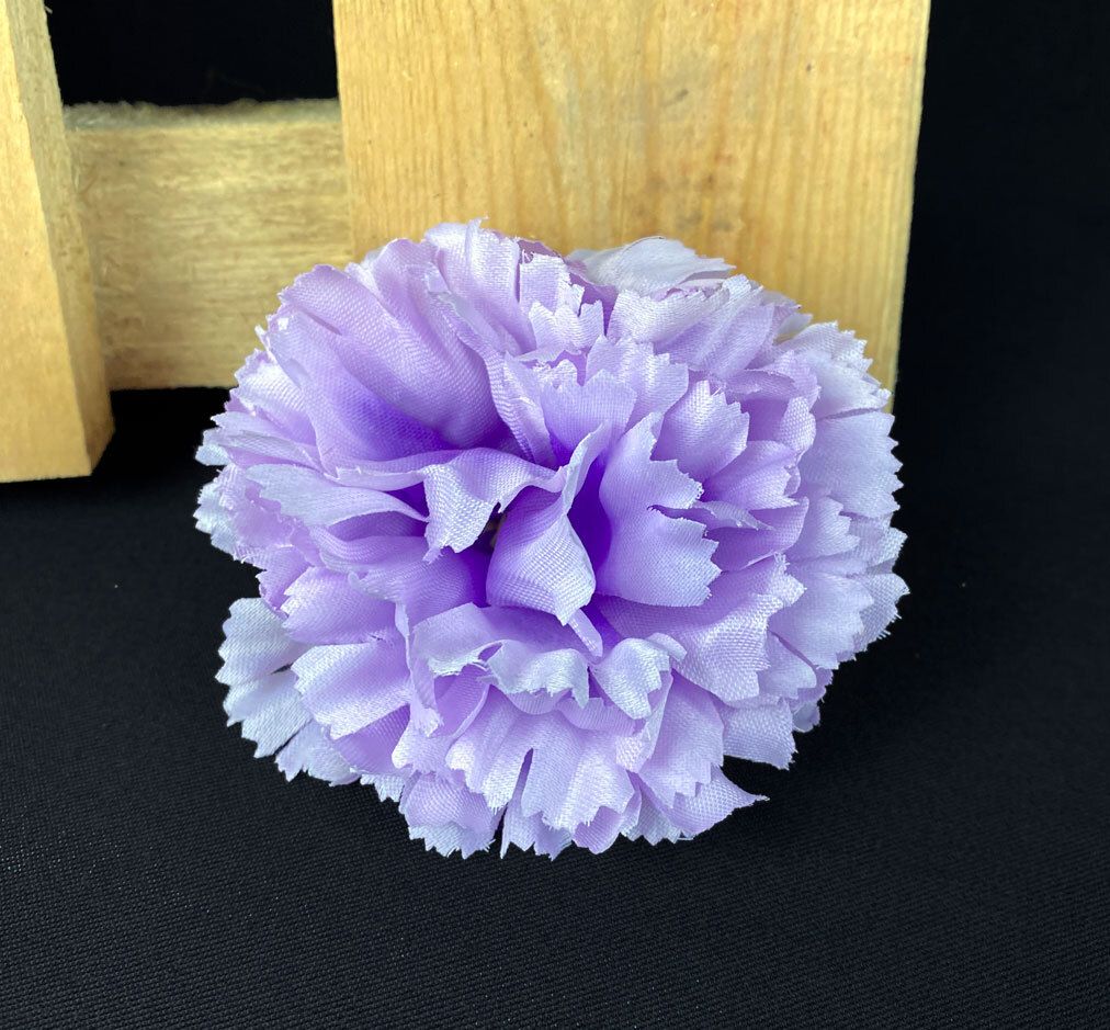 Violetti neilikka tekokukkapää