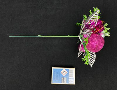 Koriste tikkuvarrella, pinkki