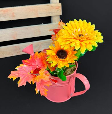 Gerbera kastelukannuruukussa, keinotekoinen asetelma