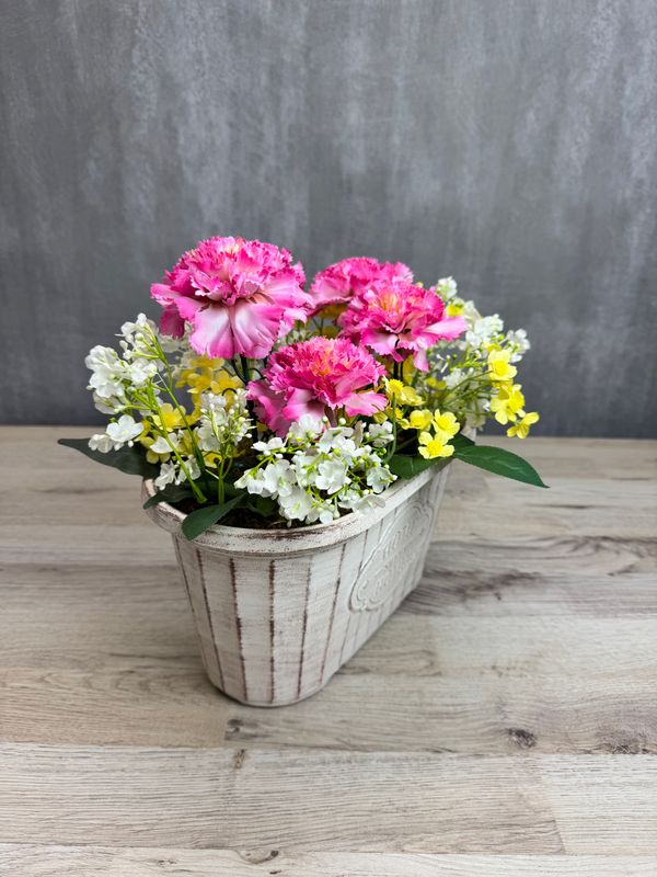 Neilikka tekokukka-asetelma