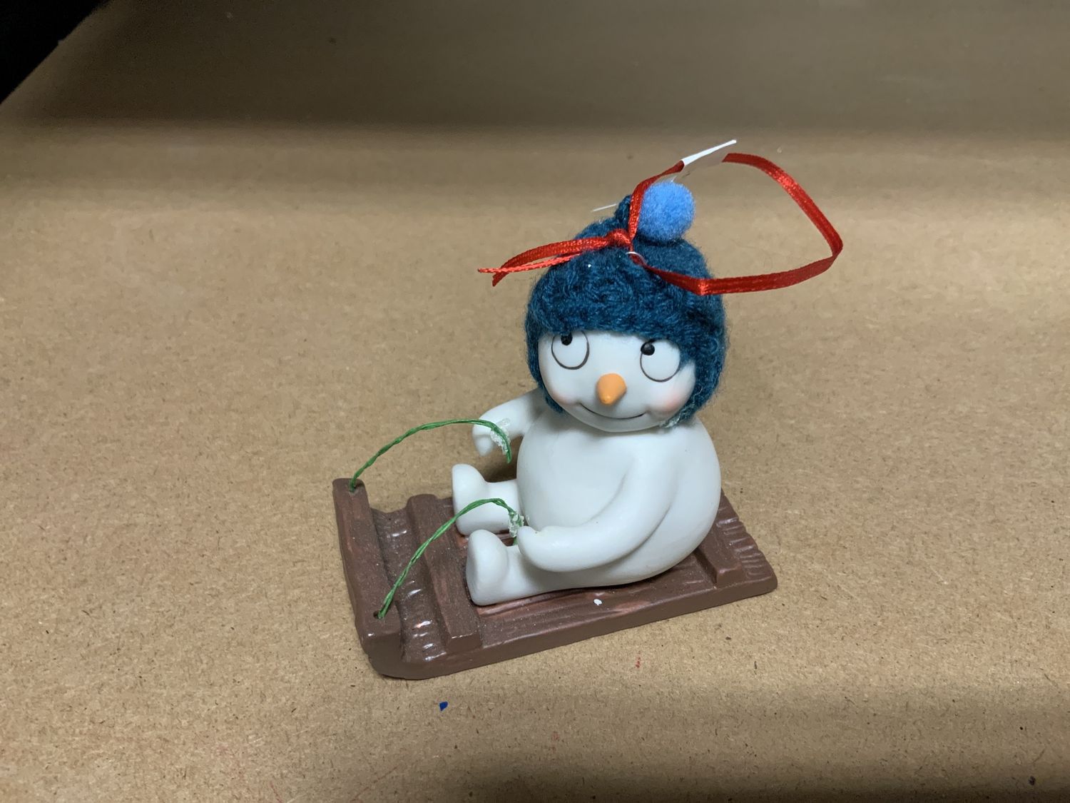 Ornament, Sledding Snowman 2.75"