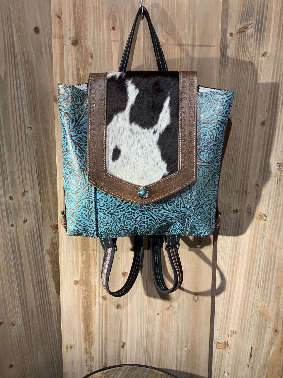 Hand Tooled, Blue Tales