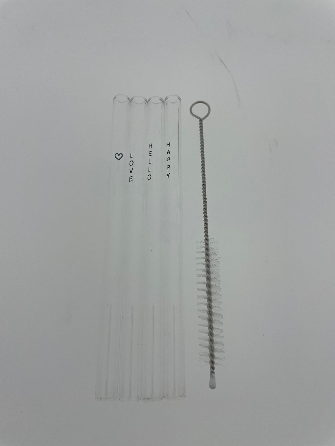 Set glazen rietjes met tekst