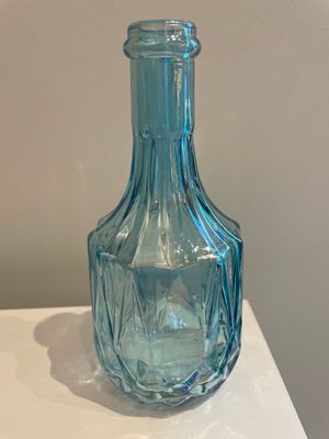 Glazen vaasjes met parelmoerglans