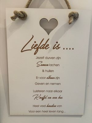 Tekstbord : Liefde is....