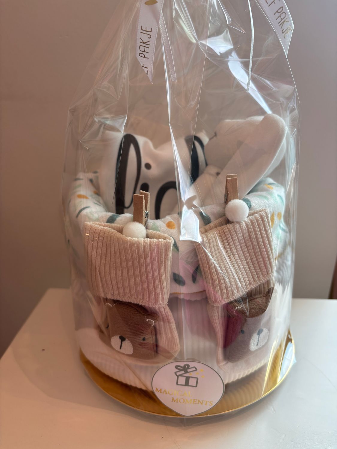 Opbergmandje met lieve babyspulletjes