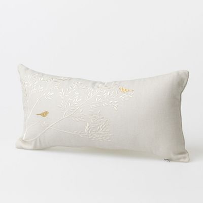 Kussen met gouden vogels
