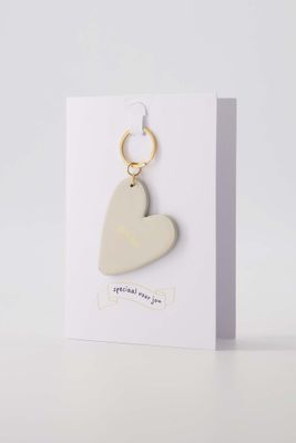 Wenskaart met sleutelhanger 'Geniet'