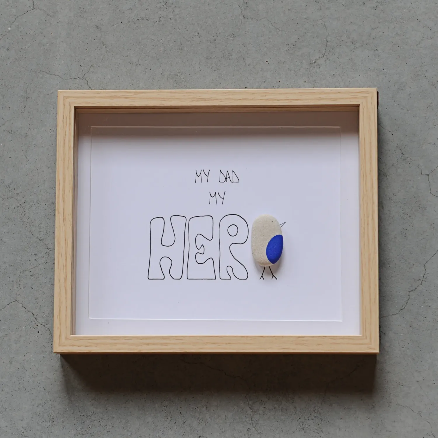 Pebble art 'My dad my hero'