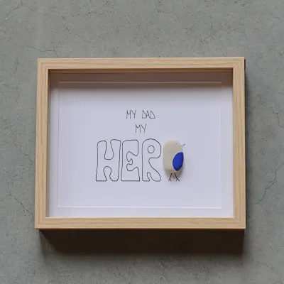 Pebble art 'My dad my hero'