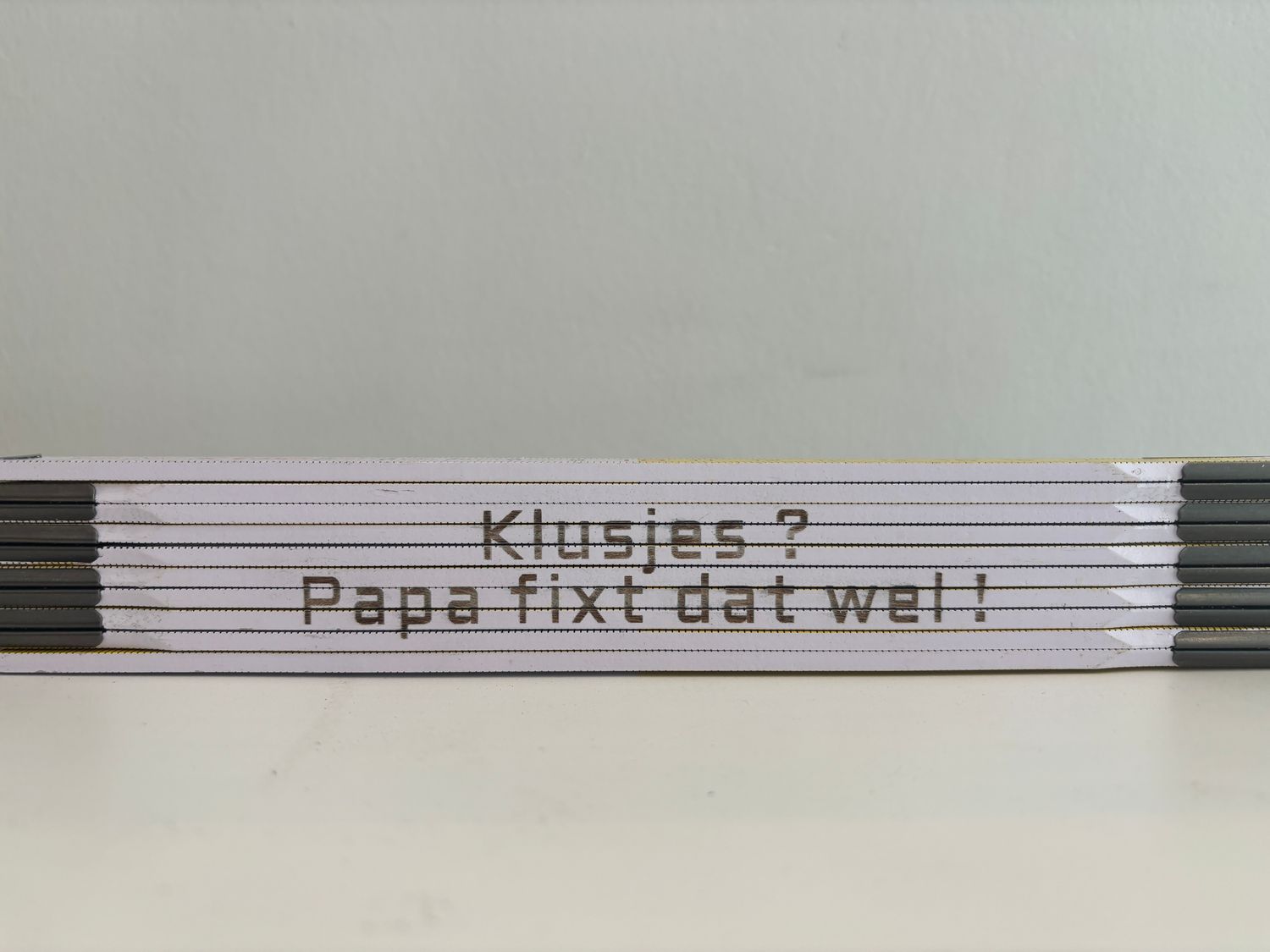 Gegraveerde vouwmeter