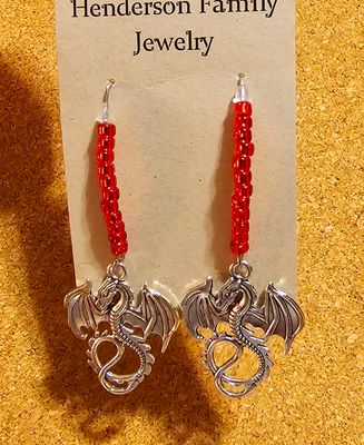 Dragons! Several sets to choose from. 
Dragons on V-posts with Gorgeous Red Beads OR Dragons with Clawfoot