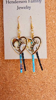 Hearts ❤️, Moons 🌙, Suns 🌞 with beadwork.