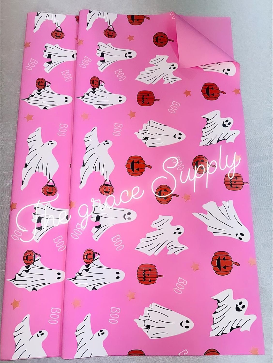 Pink Ghost and pumpkin.